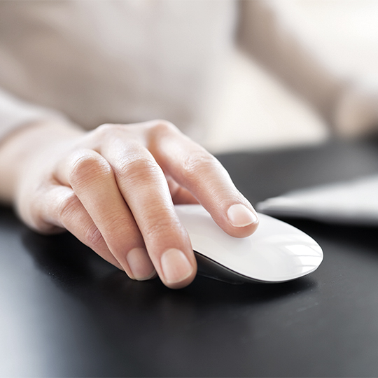 Hand using a computer mouse