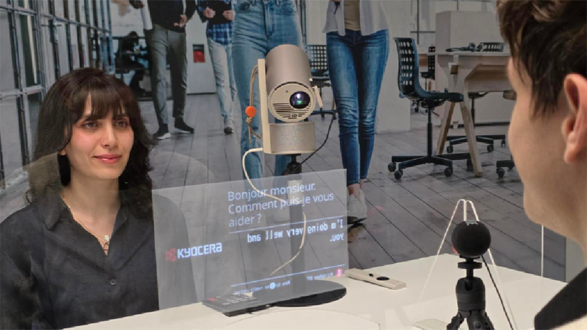 Civil servant assisting a someone using Cotopat, and its transparent screen.