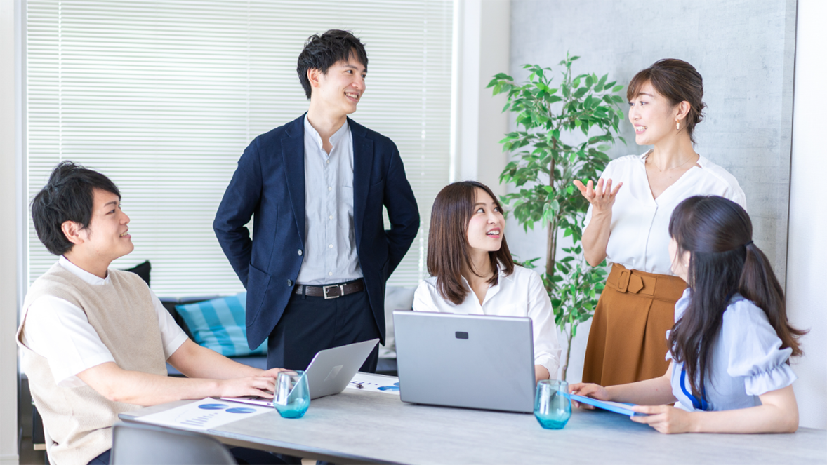 Colleagues interacting in workplace