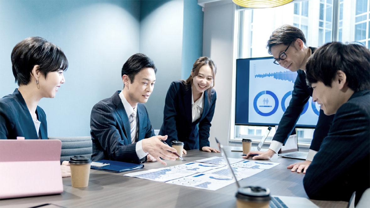 Colleagues in meeting at work.