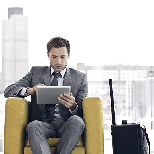 man pointing at laptop screen