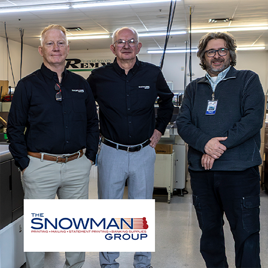 The Snowman Group, commercial printers in Maine, looking happy next to the Kyocera TASKalfa Pro 15000c production inkjet printer