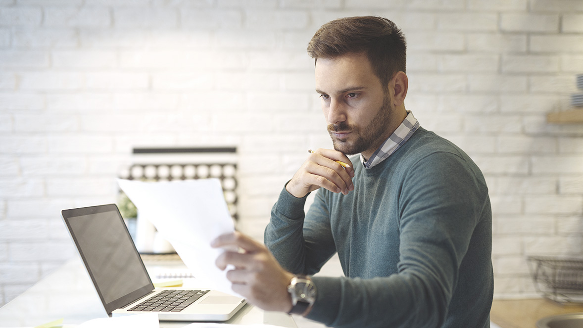 guy reading document
