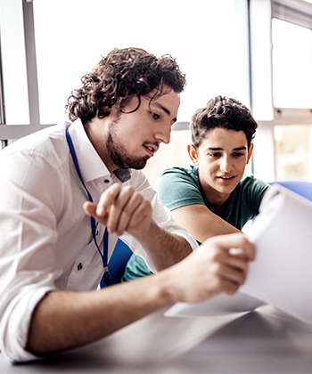 Teacher with student