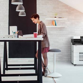 Gain a competitive edge woman working in a modern office