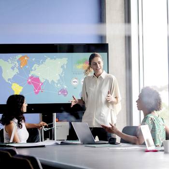 Vision Woman explaining to colleagues