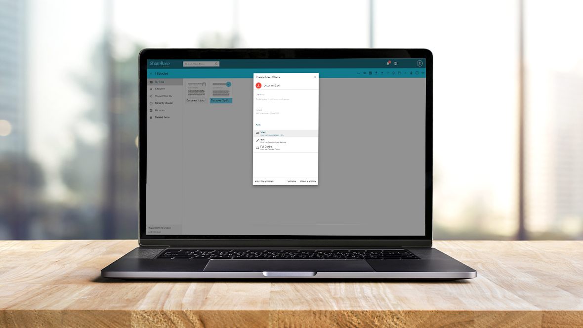 Screenshot of ShareBase application on a laptop