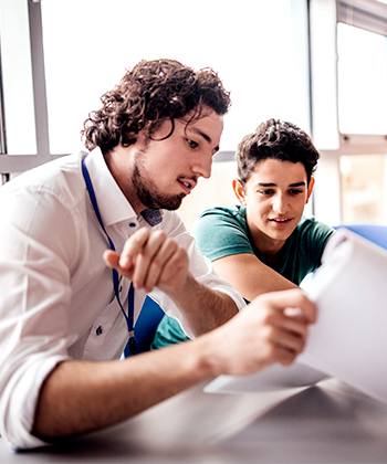 Teacher with student